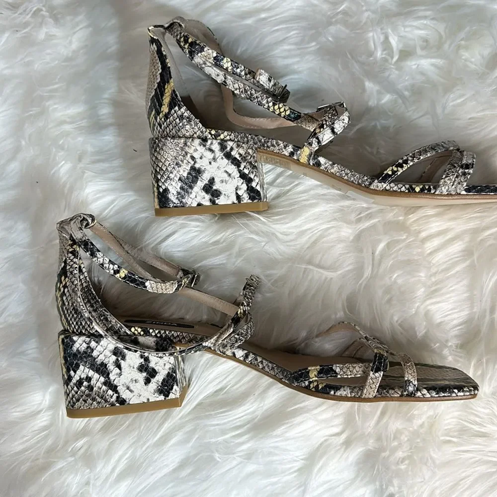 Unworn snake print wedges